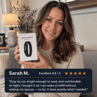 Customer holding Silent Wake — five-star review of the silent vibration alarm